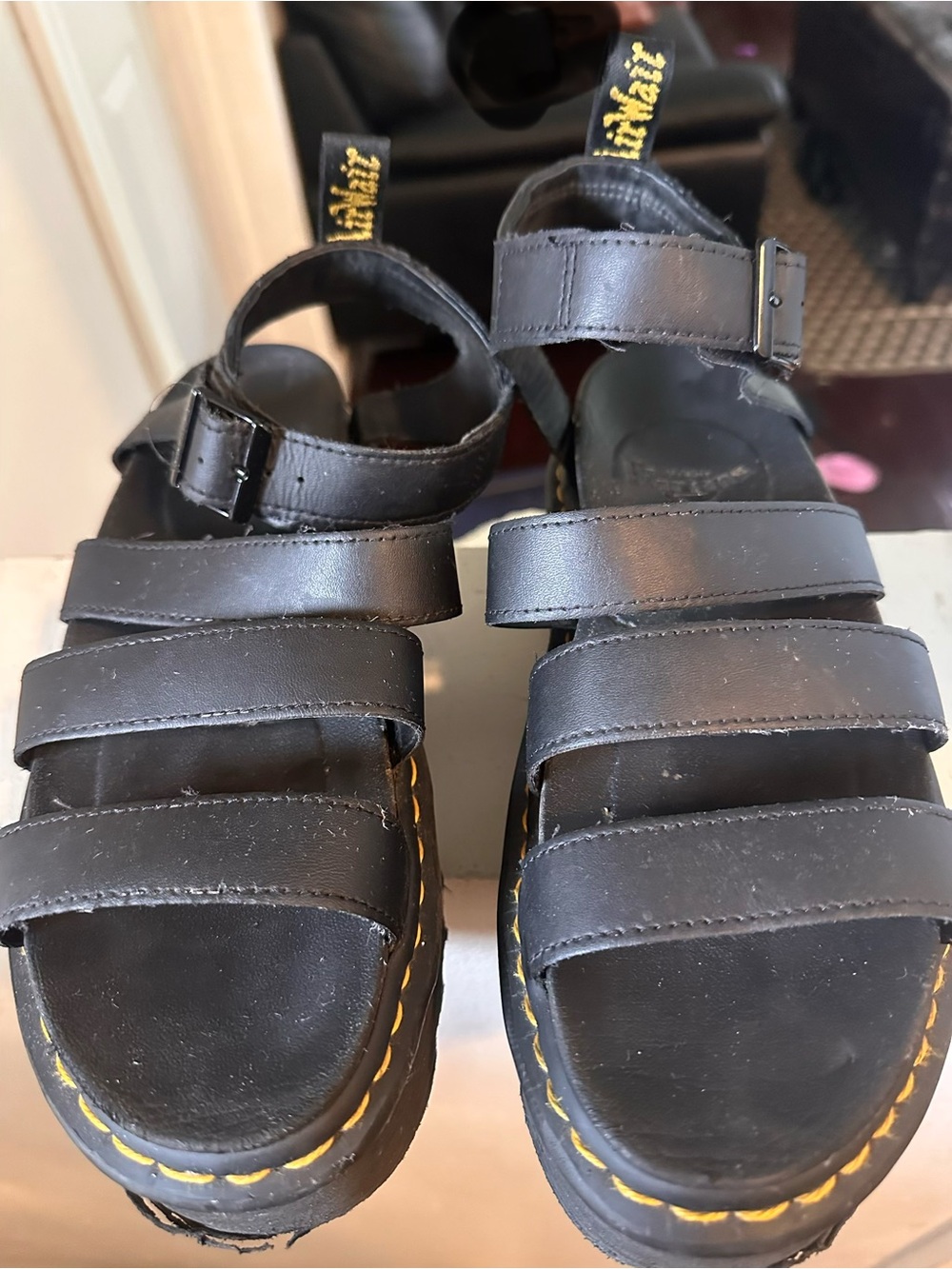 Dr. Martens Black Leather Triple-Strap Sandals with Yellow Stitching